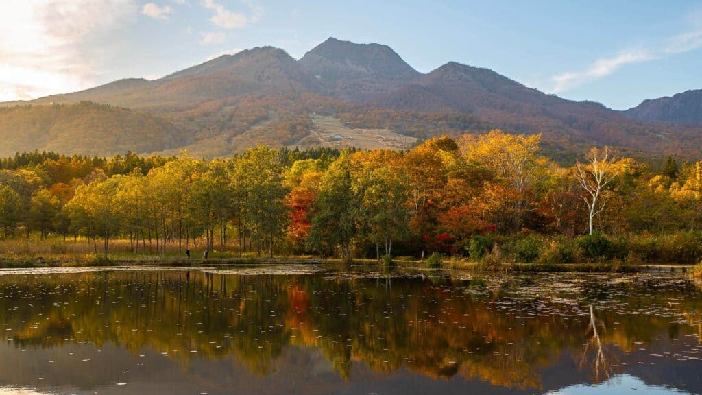 imori pond with Mt Myoko in the background in full autumn colors